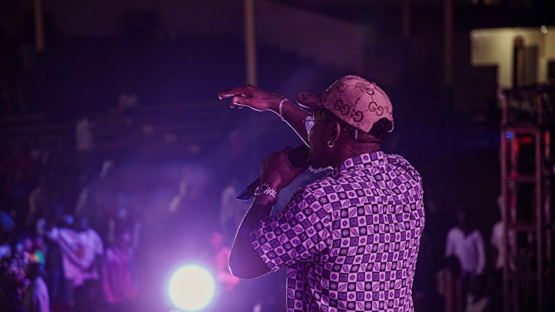 African China performing live on stage during a concert