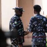 Police officers investigating a reported kidnapping case in Nigeria.
