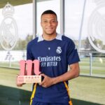 Kylian Mbappe celebrating after receiving Real Madrid Player of the Season recognition