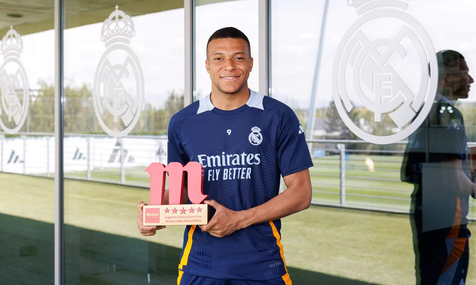 Kylian Mbappe celebrating after receiving Real Madrid Player of the Season recognition