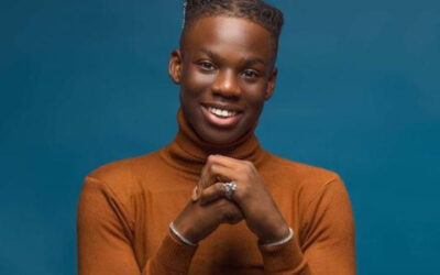 Rema discussing his past relationship during an interview