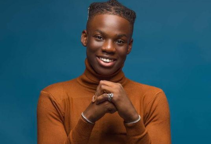 Rema discussing his past relationship during an interview
