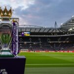 Premier League trophy ahead of new season fixtures announcement.