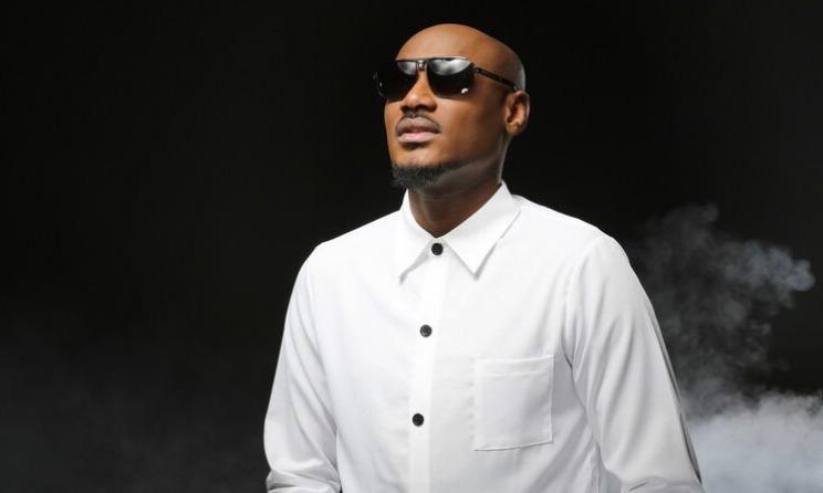 Nigerian singer 2Baba congratulating son Justin Idibia after graduation.