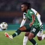 Nigeria international Ademola Lookman during a football match amid transfer speculation.