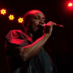 Nigerian singer Brymo performing during a music event.