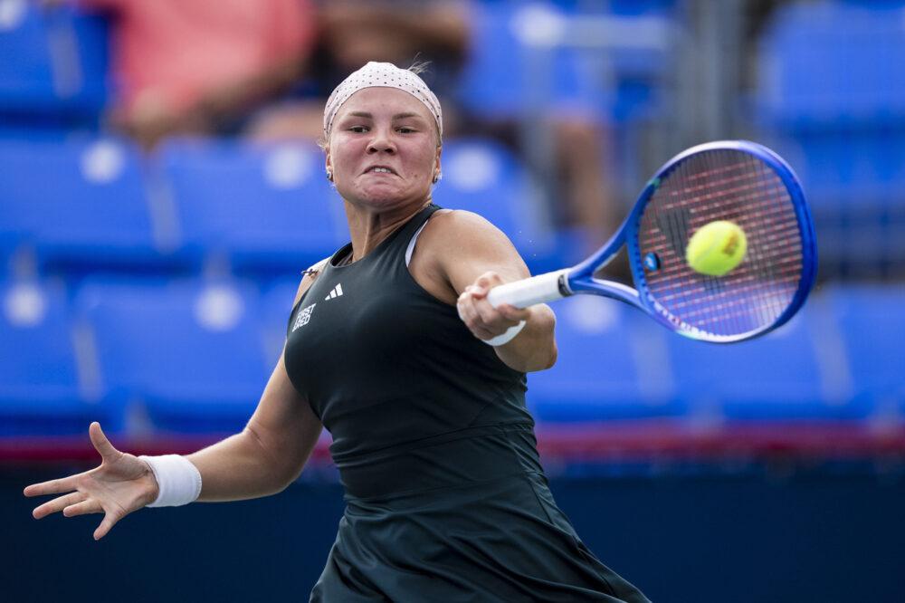 Diana Shnaider competing during a professional tennis match