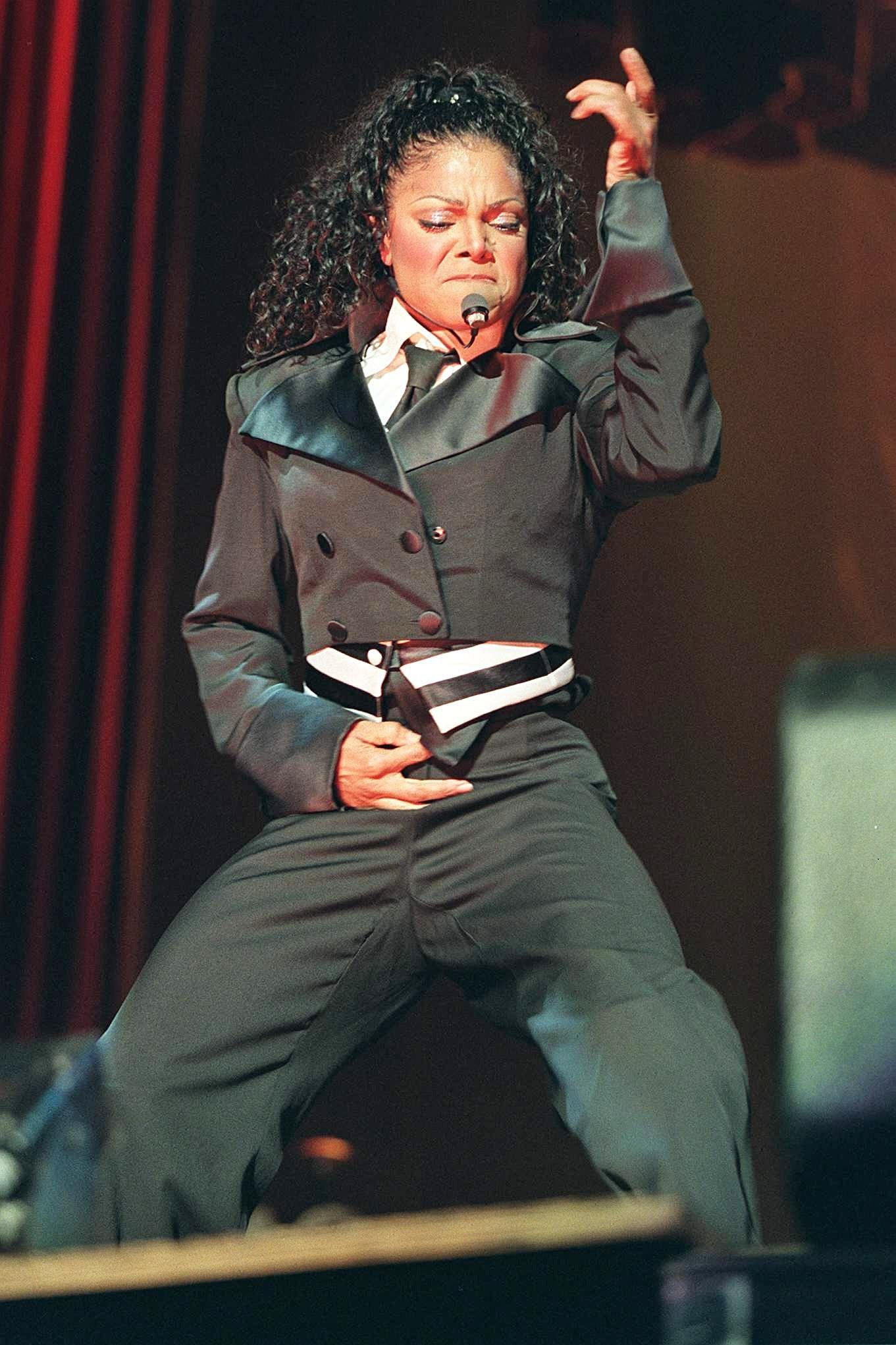 Janet Jackson performing on stage during a live music concert.