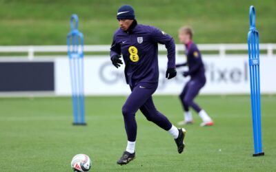 Jude Bellingham during an England training session as competition for World Cup places increases.