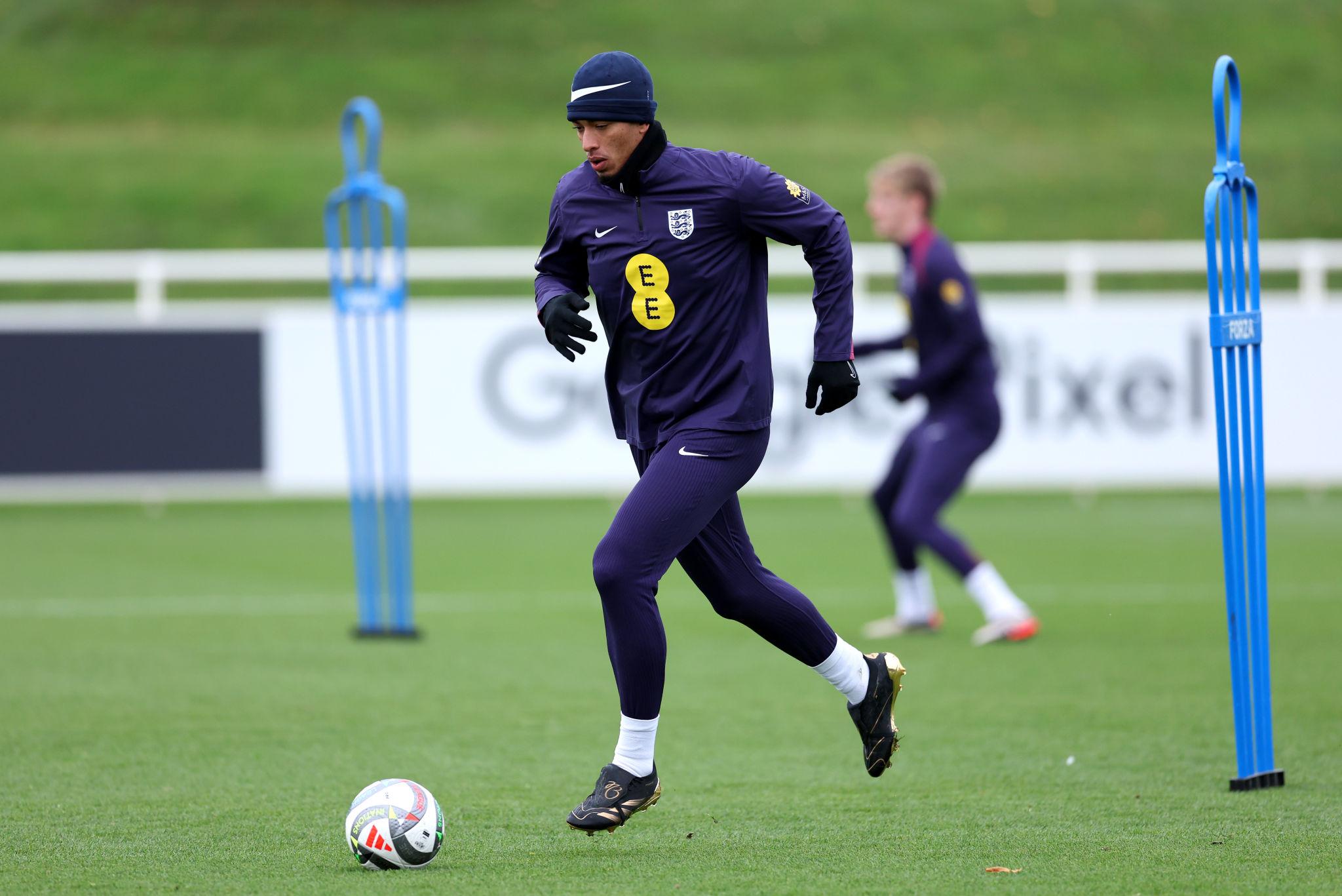 Jude Bellingham during an England training session as competition for World Cup places increases.
