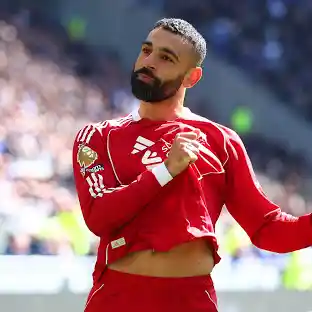 Mohamed Salah celebrates after scoring and assisting in Egypt World Cup match