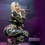 Nicki Minaj performing on stage during a music event.