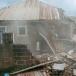Officials of Oyo State Government and police during demolition of suspected kidnappers’ hideout in Ibadan