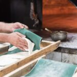 Padeiro baker preparing traditional Portuguese bread
