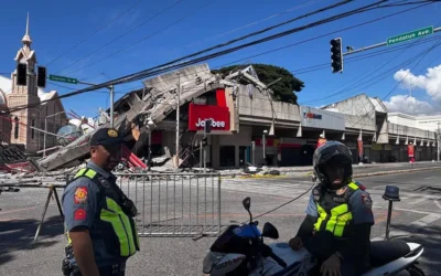 Emergency responders and residents after a powerful earthquake struck Mindanao in the Philippines.