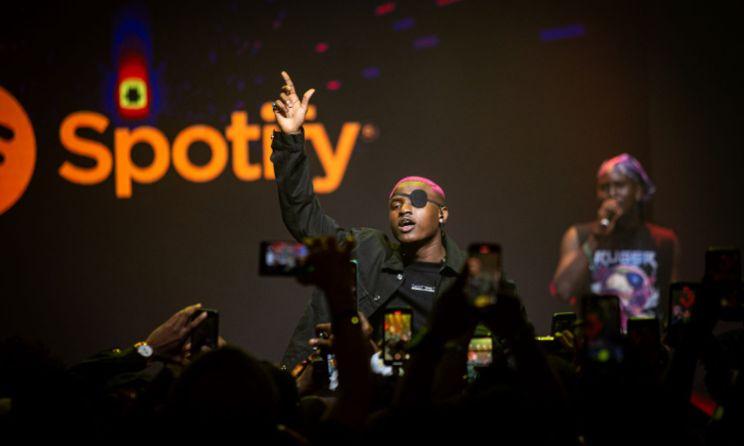 Nigerian singer Ruger during a performance amid reports of a temporary music hiatus.