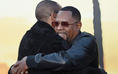 Eddie Murphy and Martin Lawrence celebrating their family connection through their children and granddaughter