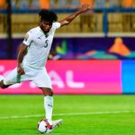 Ghana midfielder Thomas Partey playing football.