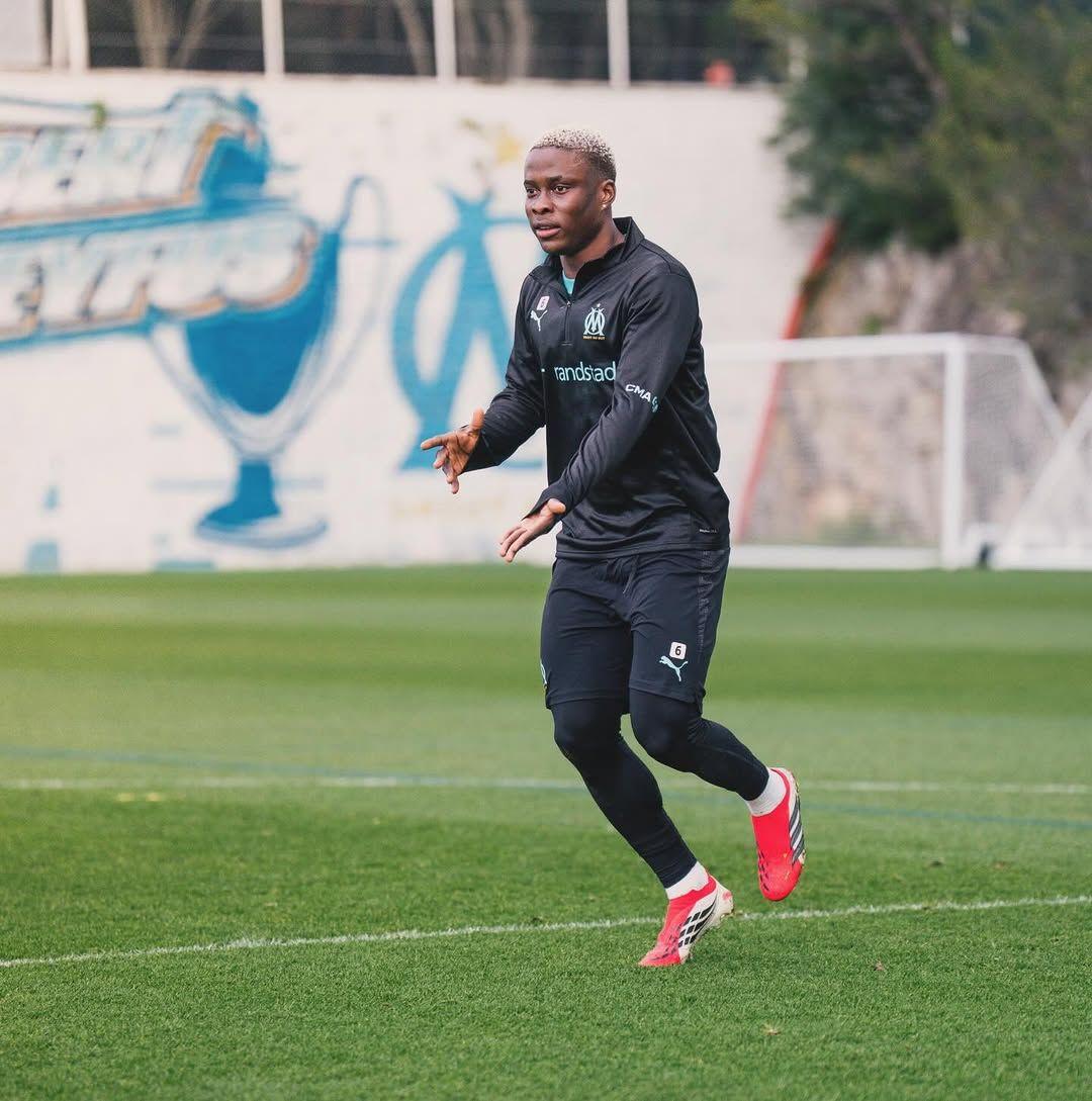 Tochukwu Nnadi playing football for Nigeria and Marseille.