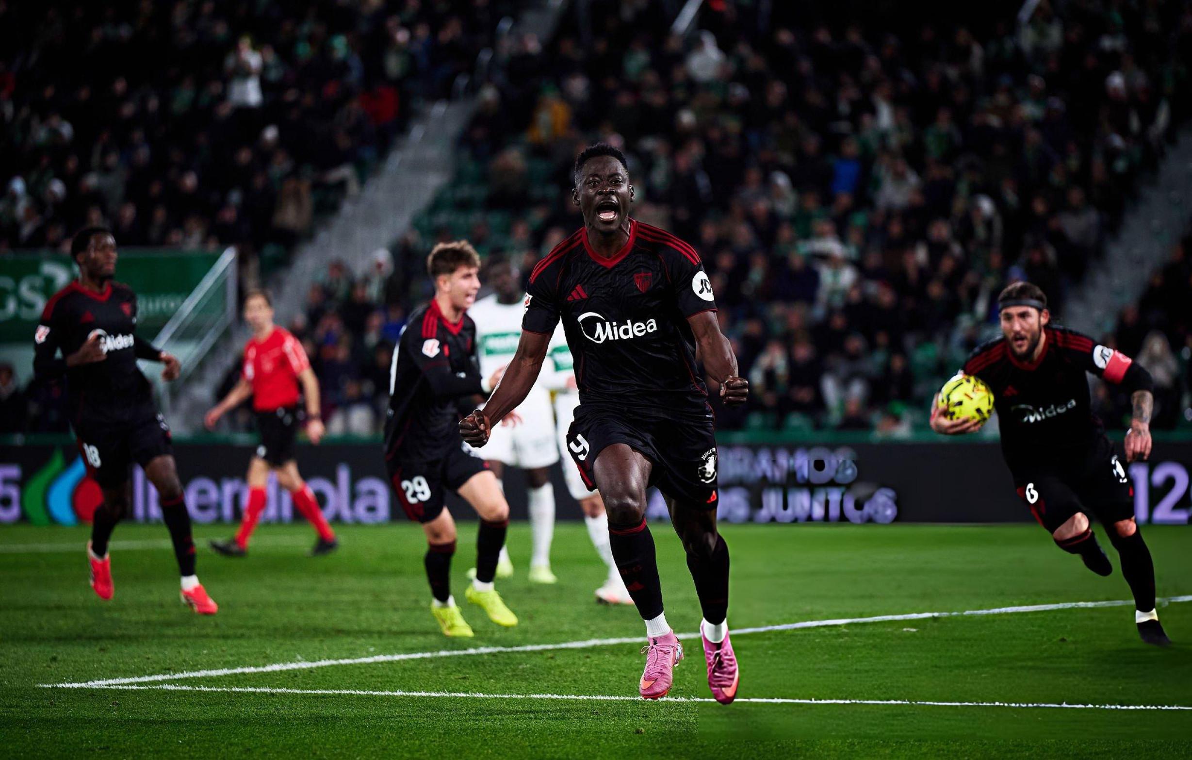 Akor Adams playing football for Sevilla.